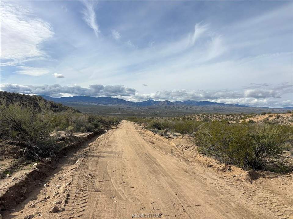 119.91 acres in Kingman in Kingman: View of dirt / gravel road with a mountain view