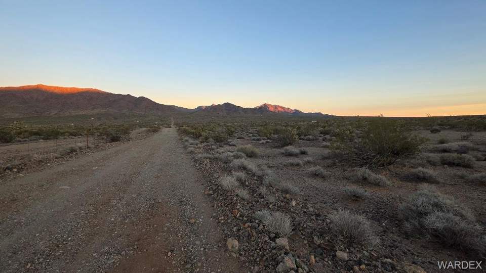 4.01 acres in Meadview in Meadview: View of dirt / gravel road featuring a mountain vi