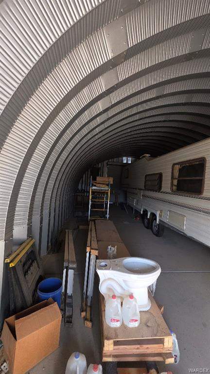 4.01 acres in Meadview in Meadview: Misc room featuring a barrel ceiling, concrete flo