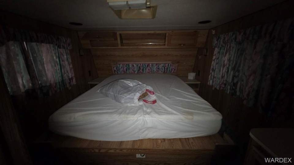 4.01 acres in Meadview in Meadview: Bedroom with wooden walls