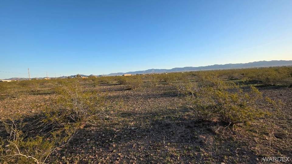 9.99 acres in Golden Valley in Golden Valley: View of mountain backdrop with rural landscape