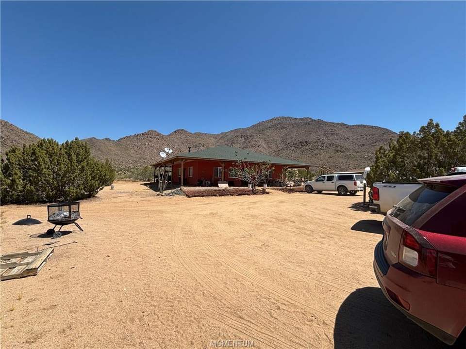 2 bed, 1 bath home on 38.55 acres in Yucca: Wrap around porch keep the home cool in summer