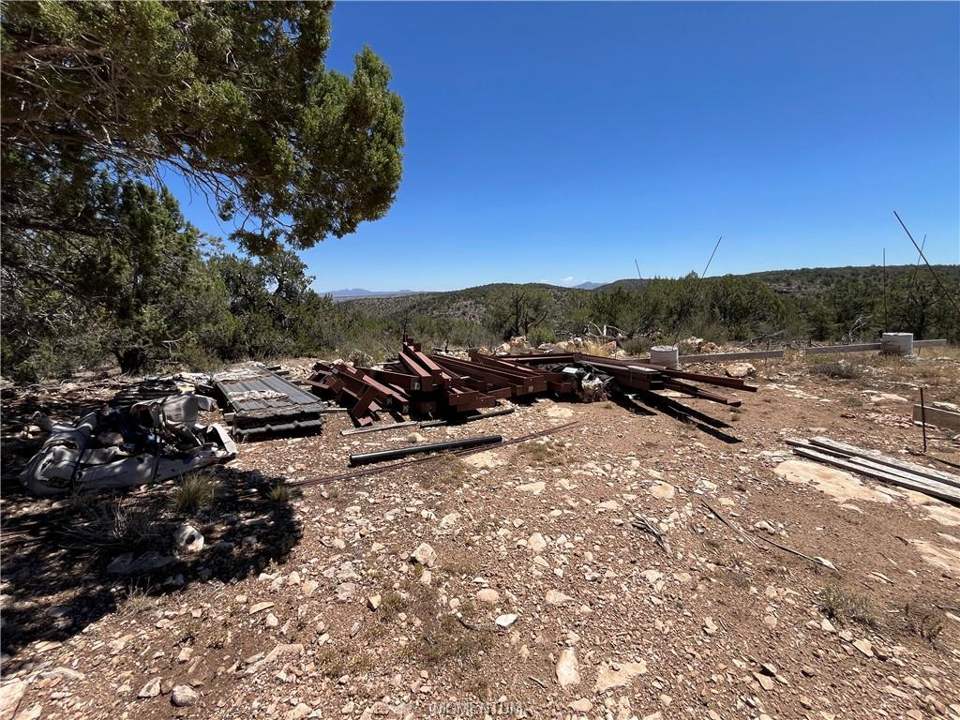 75.86 acres in Seligman in Seligman: Red iron for the metal building, and charcoal grey