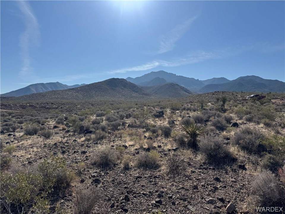 Approximately 5 acres in Dolan Springs in Dolan Springs: Expansive desert landscape with mountainous backdr