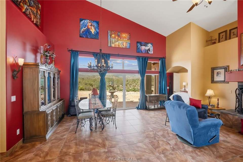 3 bed, 2 bath home on 7.66 acres in Kingman: View of entry-doors with the dining area to the le