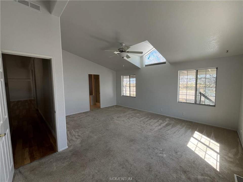 2 bed, 2 bath home in Kingman in Kingman: Spacious primary bedroom with en-suite bath and wa