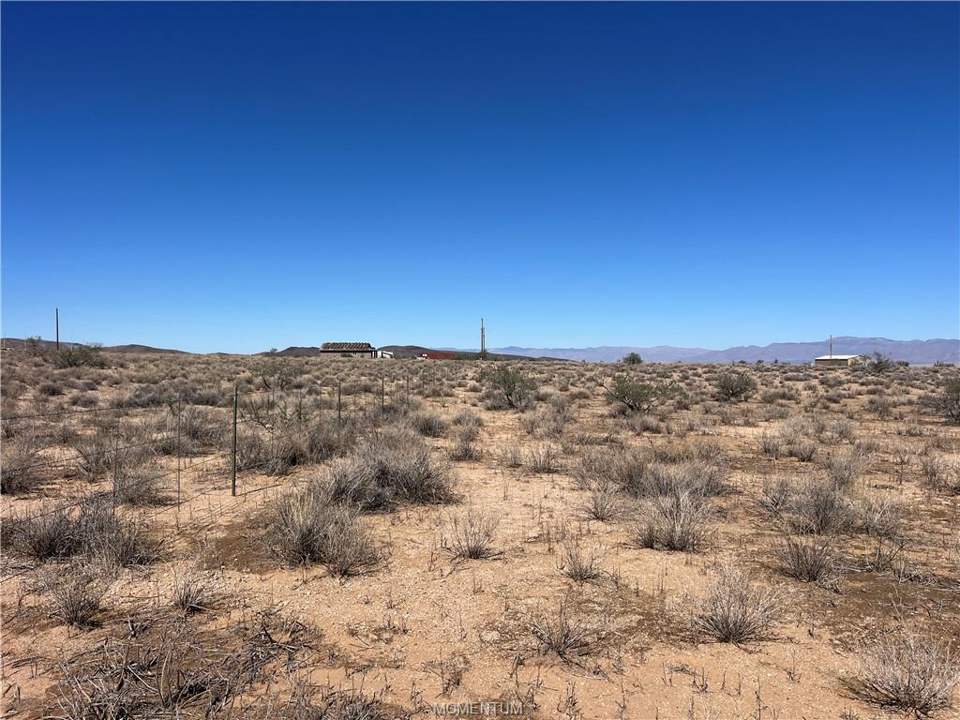 10.03 acres in Kingman in Kingman: From SW corner, looking north. Fence-line is on we