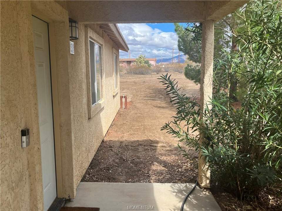 3 bed, 2 bath home on 2.5 acres in Golden Valley: Covered Front Entry with Room for Chairs to Enjoy