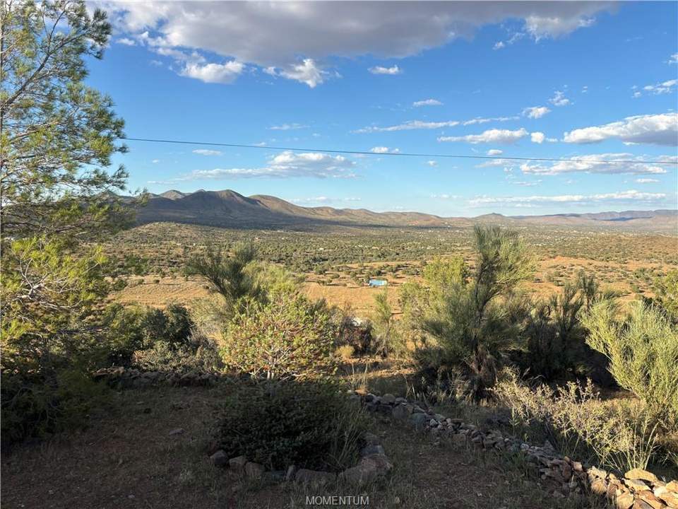 3 bed, 2 bath home on 26 acres in Kingman: Can you relax gazing out at this with a cool drink